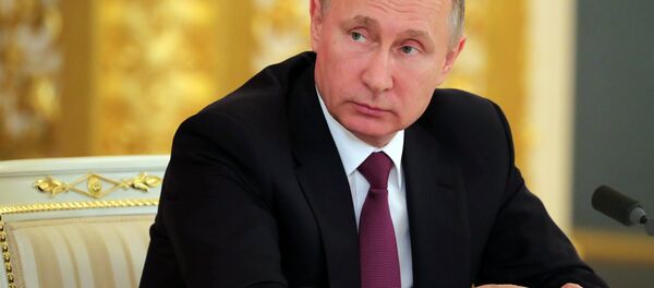 لقاء الرئيس الروسي فلاديمير بوتين ونظيره الصيني شي جين بينغ في موسكو في 4 يوليو/تيموز 2017 - سبوتنيك عربي