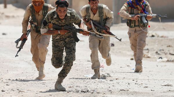 مقاتلون أكراد من وحدات حماية الشعب . - سبوتنيك عربي