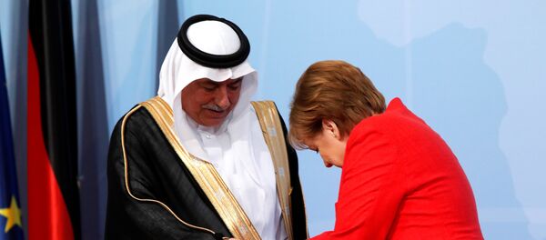 ميركل والعساف - سبوتنيك عربي