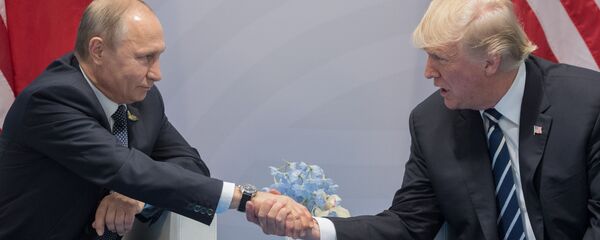 الرئيس الروسي فلاديمير بوتين والرئيس الأمريكي دونالد ترامب - سبوتنيك عربي