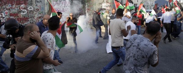 مواجهات بين الفلسطينيين وقوات الشرطة الإسرائيلية في بيت لحم، فلسطين، 19 يوليو/ تموز 2017 - سبوتنيك عربي