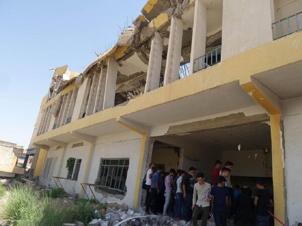 في بيتها المقصوف ..الجميلة تغلب الدواعش وأميرهم  - سبوتنيك عربي