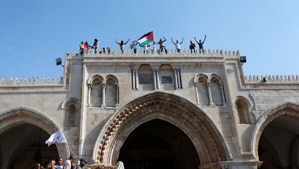 رفع العلم الفلسطيني على الأقصى - سبوتنيك عربي