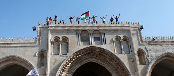 رفع العلم الفلسطيني على الأقصى - سبوتنيك عربي
