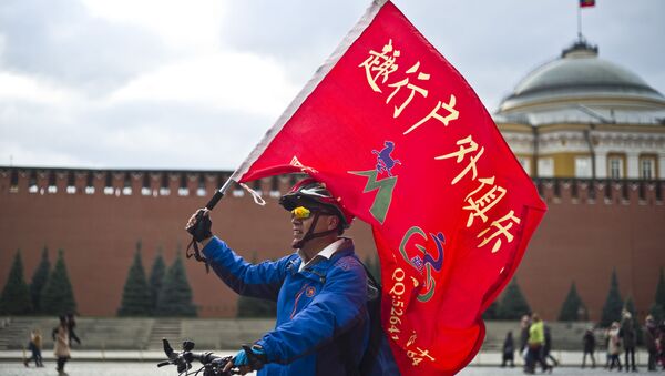 سائح صيني على الساحة الحمراء في موسكو - سبوتنيك عربي