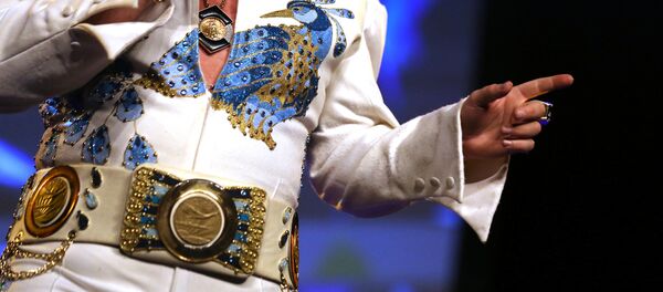 ممثل يؤدي شخصية ألفيس بريسلي في مهرجان بكندا - سبوتنيك عربي