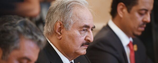 قائد الجيش الوطني الليبي، المشير خليفة حفتر خلال لقائه سيرغي لافروف في موسكو قائد الجيش الوطني الليبي، المشير خليفة حفتر خلال لقائه سيرغي لافروف في موسكو - سبوتنيك عربي