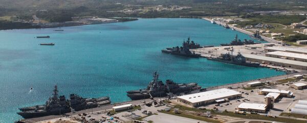 السفن الحربية في ميناء القاعدة البحرية الأمريكية على جزيرة غوام السفن الحربية في ميناء القاعدة البحرية الأمريكية على جزيرة غوام - سبوتنيك عربي