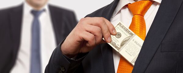 رجل أعمال يضع المال في جيبه - سبوتنيك عربي