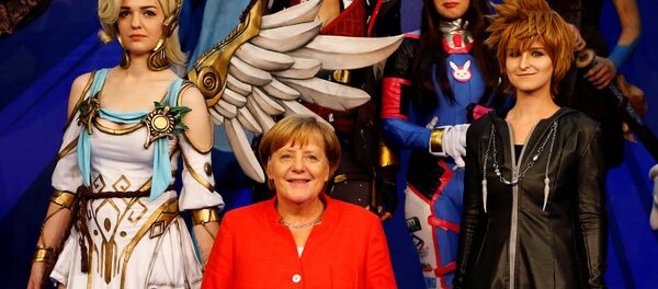 ميركل في معرض الألعاب - سبوتنيك عربي