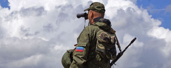 عنصر من قوات الحماية الشعبية لجمهورية لوغانسك الشعبية عنصر من قوات الحماية الشعبية لجمهورية لوغانسك الشعبية - سبوتنيك عربي