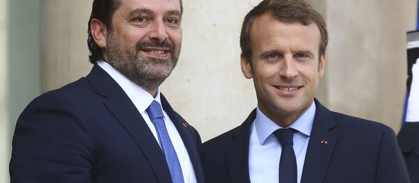 الرئيس الفرنسي إيمانويل ماكرون يرحب برئيس الوزراء اللبناني سعد الحريري في باريس، فرنسا 1 سبتمبر/ أيلول 2017 الرئيس الفرنسي إيمانويل ماكرون يرحب برئيس الوزراء اللبناني سعد الحريري في باريس، فرنسا 1 سبتمبر/ أيلول 2017 - سبوتنيك عربي
