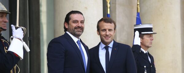 الرئيس الفرنسي إيمانويل ماكرون  ورئيس الوزراء اللبناني سعد الحريري في باريس، فرنسا 1 سبتمبر/ أيلول 2017 - سبوتنيك عربي