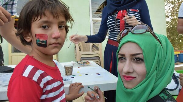 الملاهي تزين الموصل بعد خلاصها من داعش   - سبوتنيك عربي