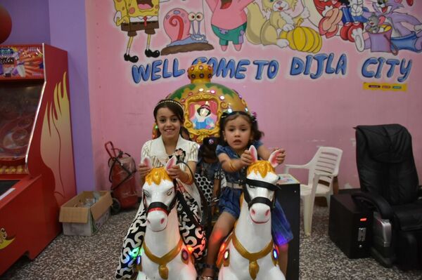 الملاهي تزين الموصل بعد خلاصها من داعش   - سبوتنيك عربي