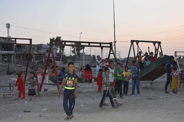 الملاهي تزين الموصل بعد خلاصها من داعش   - سبوتنيك عربي