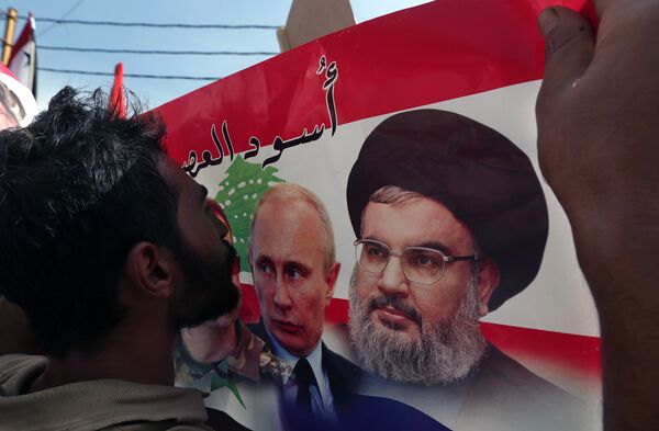 بوتين ونصرالله بوتين ونصرالله - سبوتنيك عربي