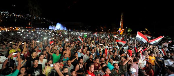 أفراح السوريين بمنتخب بلادهم أفراح السوريين بمنتخب بلادهم - سبوتنيك عربي