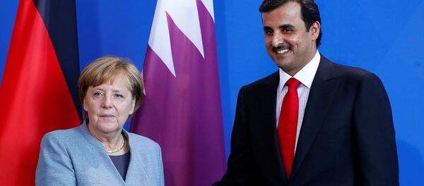 المستشلرة الألمانية أنغيلا ميركل و أمير قطر - سبوتنيك عربي