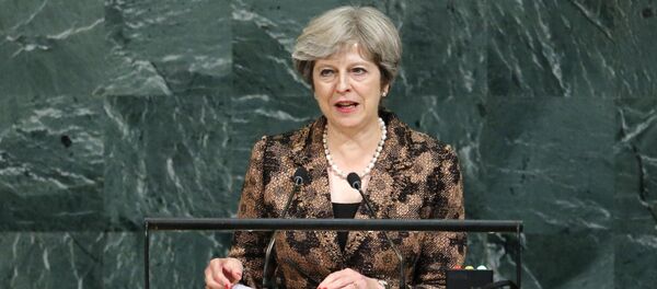 رئيسة وزراء بريطانيا تيريزا ماي - سبوتنيك عربي