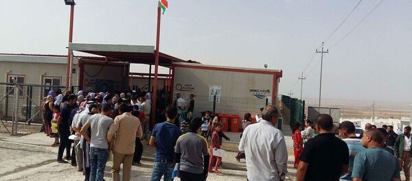 استفتاء إقليم كردستان في مخيم قارية - سبوتنيك عربي