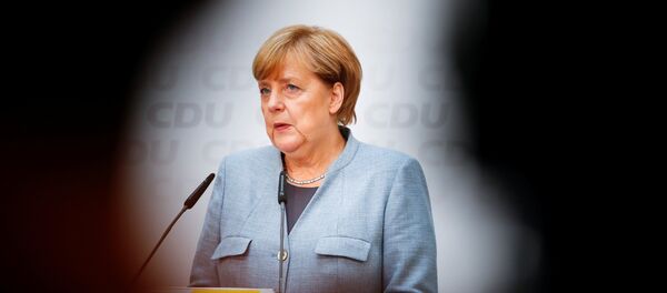 ميركل ميركل - سبوتنيك عربي