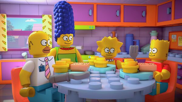 This image released by FOX shows characters from the animated series, The Simpsons, from left, Homer, Marge, Lisa and Bart, as Lego figures - سبوتنيك عربي