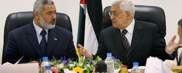 الرئيس الفلسطيني محمود عباس والأمين العام لحركة حماس إسماعيل هنية الرئيس الفلسطيني محمود عباس والأمين العام لحركة حماس إسماعيل هنية - سبوتنيك عربي