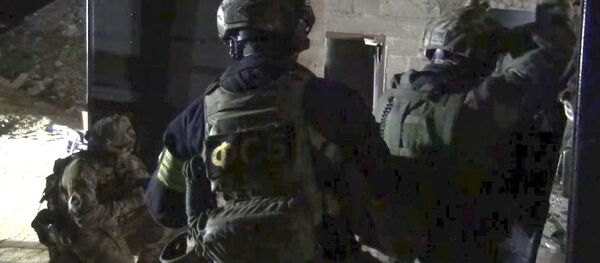 ضباط خلال عملية خاصة في داغستان - سبوتنيك عربي