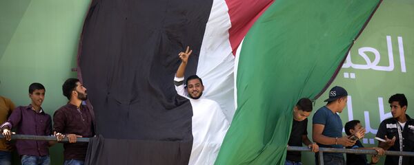 من فعاليات استقبال وفد من المسؤولين من حركة فتح ورئيس الوزراء الفلسطيني رامي الحمدالله إلى مدينة غزة، قطاع غزة، فلسطين 2 أكتوبر/ تشرين الأول 2017 من فعاليات استقبال وفد من المسؤولين من حركة فتح ورئيس الوزراء الفلسطيني رامي الحمدالله إلى مدينة غزة، قطاع غزة، فلسطين 2 أكتوبر/ تشرين الأول 2017 - سبوتنيك عربي