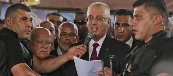 رئيس الوزراء الفلسطيني رامي الحمدالله أثناء إلقاء كلمة في مدينة غزة، قطاع غزة، فلسطين 2 أكتوبر/ تشرين الأول 2017 رئيس الوزراء الفلسطيني رامي الحمدالله أثناء إلقاء كلمة في مدينة غزة، قطاع غزة، فلسطين 2 أكتوبر/ تشرين الأول 2017 - سبوتنيك عربي