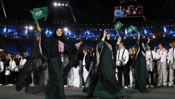 الرياضيات السعوديات خلال حفل افتتاح الألعاب الأولمبية الصيفية 2012، لندن 27 يوليو/ تموز 2012 - سبوتنيك عربي