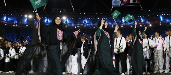 الرياضيات السعوديات خلال حفل افتتاح الألعاب الأولمبية الصيفية 2012، لندن 27 يوليو/ تموز 2012 - سبوتنيك عربي