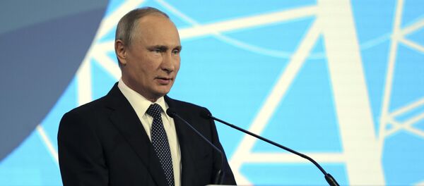 الرئيس الروسي فلاديمير بوتين خلال أسبوع الطاقة الروسية - سبوتنيك عربي