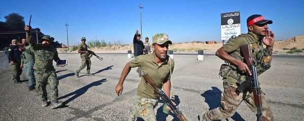 معركة تحرير الحويجة، القوات العراقية، الجيش العراقي، الحشد الشعبي، العراق 4 أكتوبر/ تشرين الأول 2017 - سبوتنيك عربي