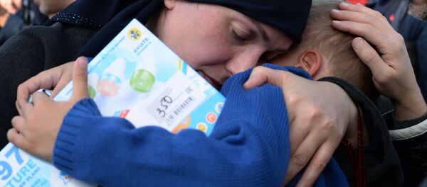 وصول أطفال روس، الذين تم انقاذهم في العراق، إلى مطار غروزني، الشيشان وصول أطفال روس، الذين تم انقاذهم في العراق، إلى مطار غروزني، الشيشان - سبوتنيك عربي