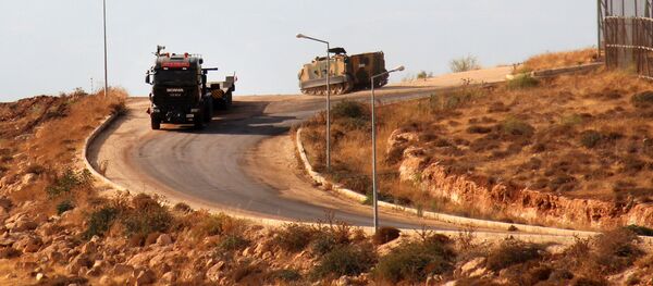 آليات عسكرية تركية تدخل الأراضي السورية متجهة إلى إدلب - سبوتنيك عربي