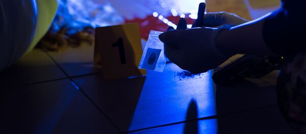 شرطي في مكان الجريمة - سبوتنيك عربي