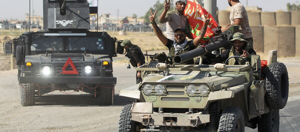 القوات العراقية تتقدم الأحياء الجنوبية في كركوك، العراق 16 أكتوبر/ تشرين الأول 2017 القوات العراقية تتقدم الأحياء الجنوبية في كركوك، العراق 16 أكتوبر/ تشرين الأول 2017 - سبوتنيك عربي