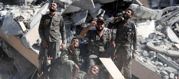 القوات الديموقراطية السورية في الرقة، سوريا 17 أكتوبر/ تشرين الأول 2017 - سبوتنيك عربي