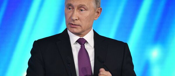 الرئيس الروسي فلاديمير بوتين يلقي كلمة في منتدى فالداي الدولي - سبوتنيك عربي