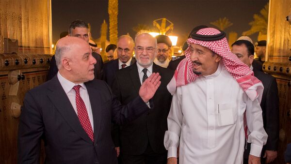 العاهل السعودي الملك سلمان ورئيس وزراء العراق حيدر العبادي - سبوتنيك عربي