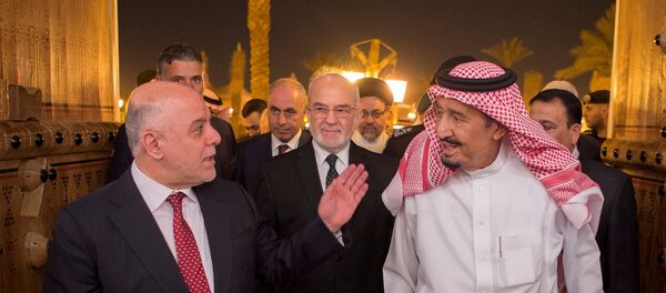 العاهل السعودي الملك سلمان ورئيس وزراء العراق حيدر العبادي - سبوتنيك عربي