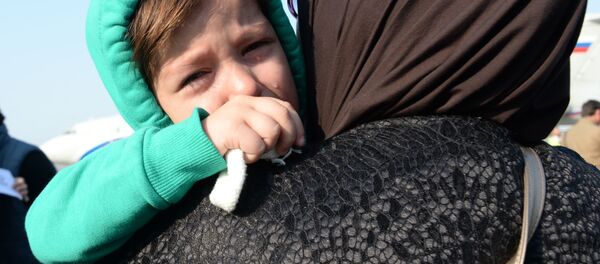 وصل أطفال روس من سوريا إلى مطار غروزني في الشييان - سبوتنيك عربي