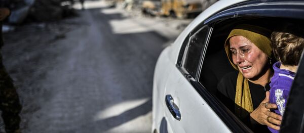 القوات الديموقراطية السورية في مدينة الرقة بعد تحريرها، سوريا 20 أكتوبر/ تشرين الأول 2017 القوات الديموقراطية السورية في مدينة الرقة بعد تحريرها، سوريا 20 أكتوبر/ تشرين الأول 2017 - سبوتنيك عربي