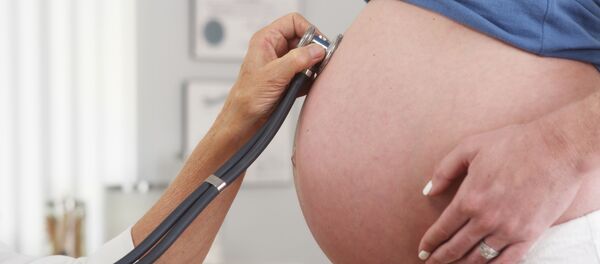 امرأة حامل امرأة حامل - سبوتنيك عربي