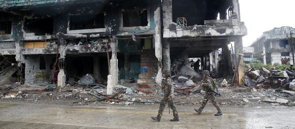 آثار الدمار في مدينة مراوي، بعد معارك شرسة ضد إرهابيي تنظيم داعش، الفلبين 25 أكتوبر/ تشرين الأول 2017 - سبوتنيك عربي