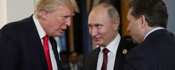 بوتين وترامب في قمة إبيك - سبوتنيك عربي