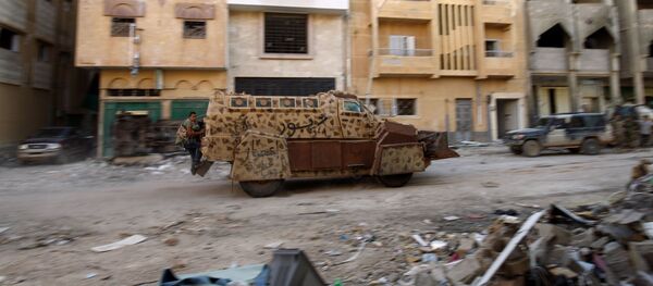 عناصر الجيش الوطني الليبي خلال مواجهة إرهابيي تنظيم داعش في بنغازي، ليبيا 9 نوفمبر/ تشرين الثاني 2017 - سبوتنيك عربي