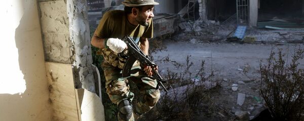 عناصر الجيش الوطني الليبي خلال مواجهة إرهابيي تنظيم داعش في بنغازي، ليبيا 9 نوفمبر/ تشرين الثاني 2017 - سبوتنيك عربي